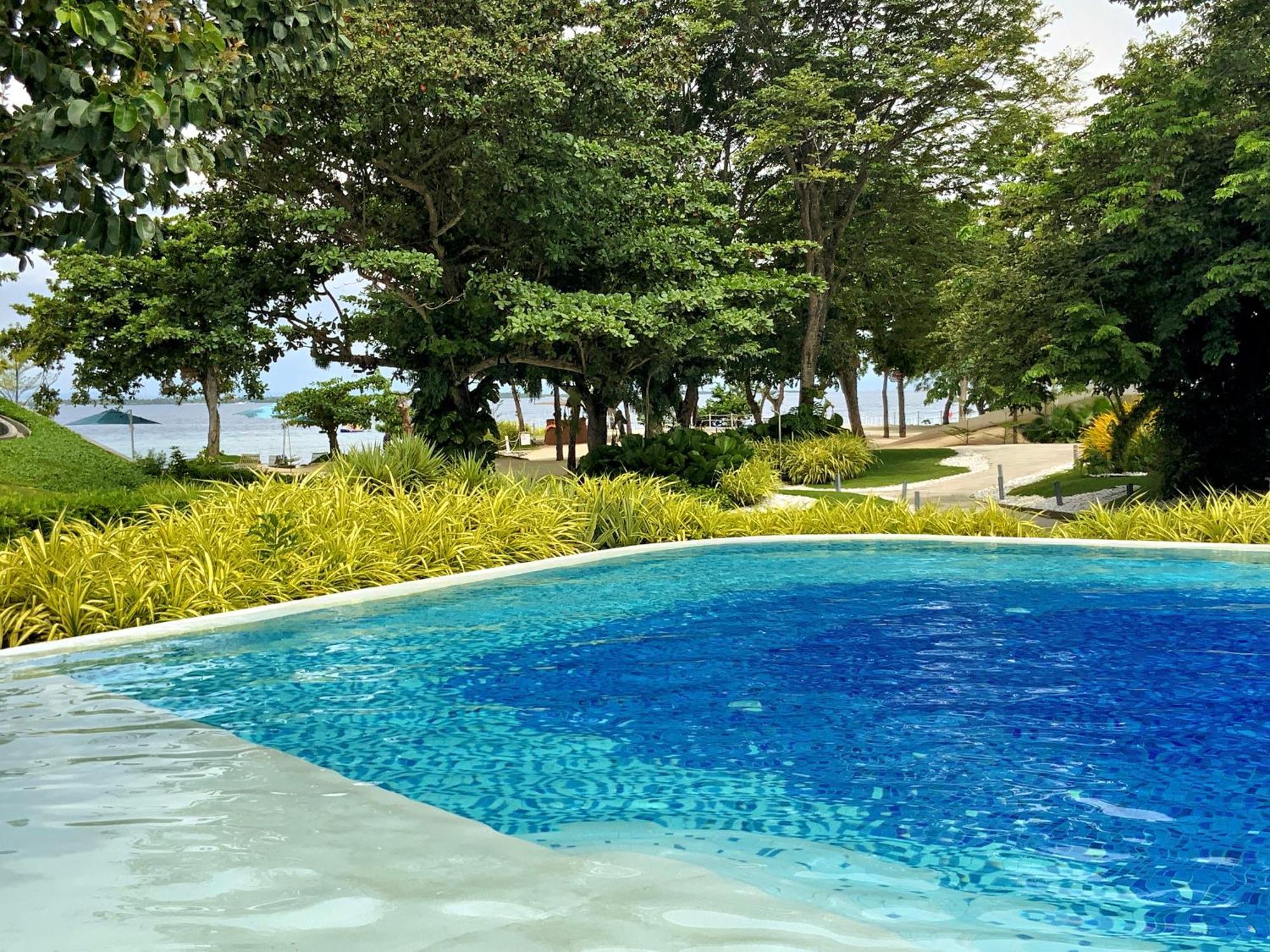 Dominiks Stylish Resort Gem Ocean View Pool Queen Bed At Tambuli 8 Floor Fast Wifi マクタン エクステリア 写真